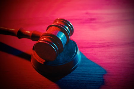 Wooden gavel on table, law and legal conceptの写真素材