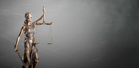 Blind justice symbol on a metallic statue. Law and justice concept, copy spaceの写真素材
