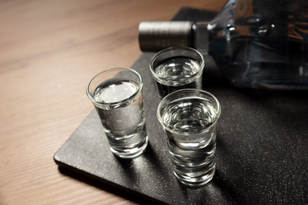 Glasses with vodka on the table. Alcohol closeupの写真素材