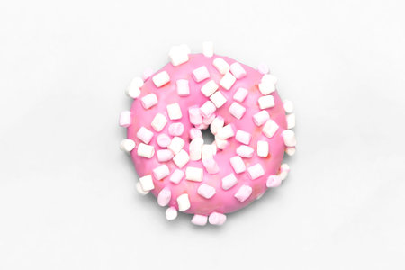 Delicious donut on white background. Single donut with marshmallow, top view