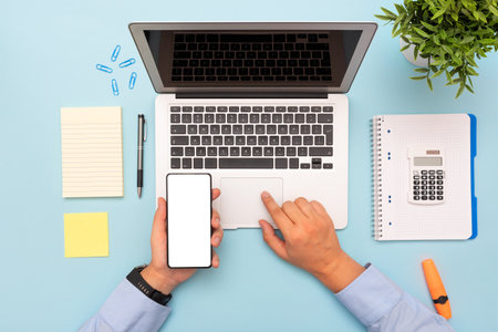 Laptop and smartphone top view, mockup workplace conceptの写真素材