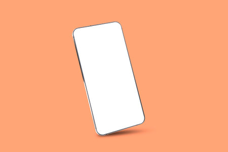 Modern smartphone mockup, blank screen on orange backgroundの写真素材