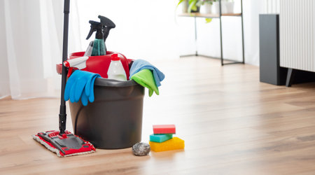 Mop bucket with a cleaning supplies, cleaning services conceptの写真素材