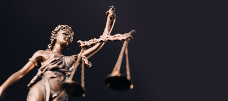 Justice statue of a woman holding scales. Law and justice conceptの写真素材
