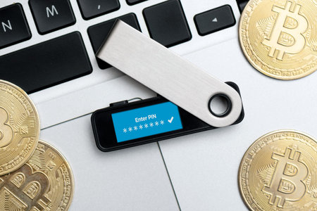 Saving cryptocurrency coins into secure digital wallet. Bitcoin secure wallet