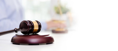 Wooden gavel sits on a wooden base. Lawyer or attorney conceptの写真素材