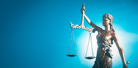 The Statue of Justice symbol on sky backgroundの写真素材
