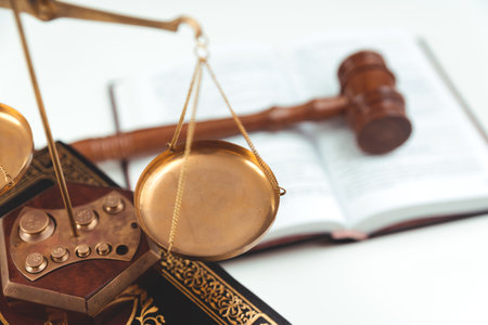 Weight scale and wooden gavel in background. Copy space image. Law and justice conceptの写真素材