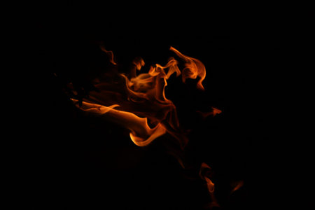 Fire flames on black background, abstract fire flames isolated on black background