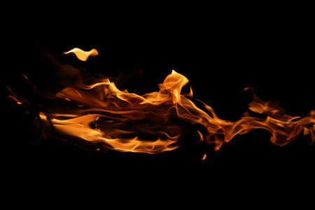 Fire flames on black background, abstract fire flames isolated on black background