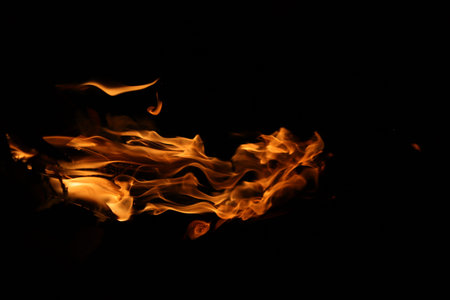 Fire flames on a black background, abstract fire flames on a black background