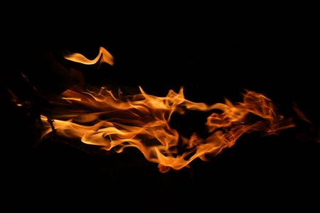 Fire flames on black background, abstract fire flames isolated on black background