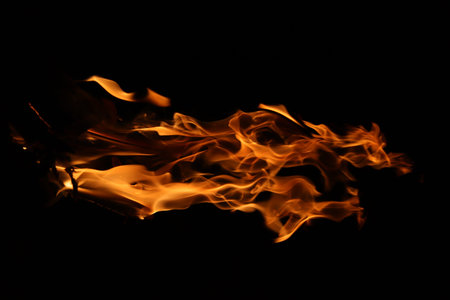 Fire flames on black background, abstract fire flames isolated on black background