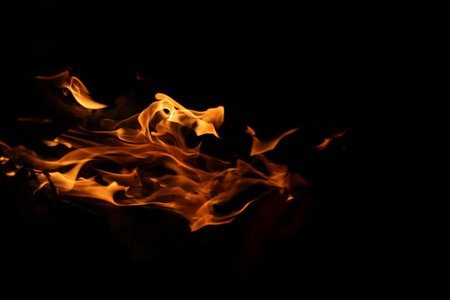 Fire flames on a black background as an abstract background. textureの写真素材