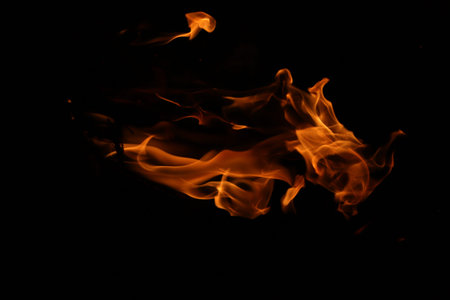 Fire flames on a black background, fire patterns on a black background