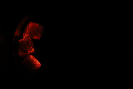 Glowing coals with glitch style lighting, enriched by noise, effect and grain details, create a...