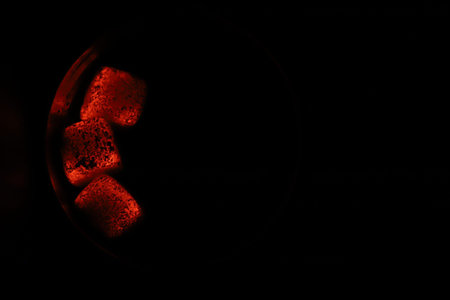 Glowing coals with glitch style lighting, enriched by noise, effect and grain details, create a...