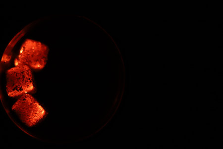 Glowing coals with glitch style lighting, enriched by noise, effect and grain details, create a...