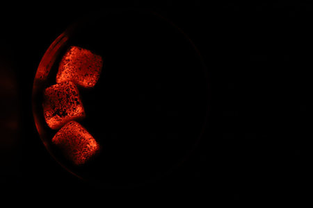 Glowing coals with glitch style lighting, enriched by noise, effect and grain details, create a...