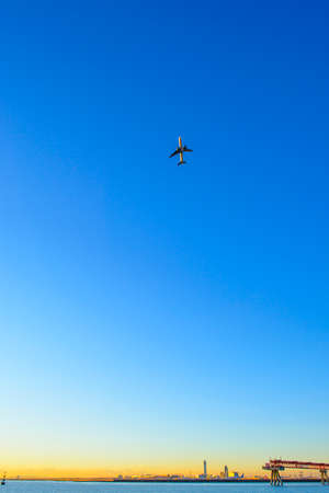 sunrise with airplaneの写真素材