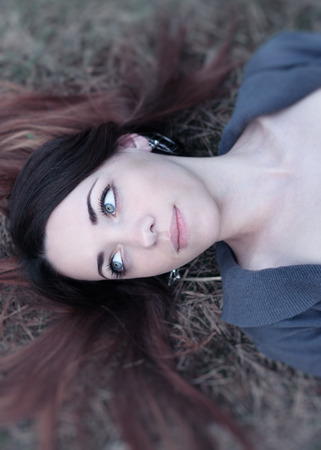 beautiful sensual woman in wood harmony with natureの写真素材