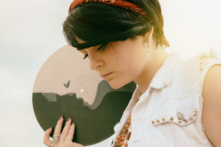 portrait of young active girl of the hipster outdoorsの写真素材