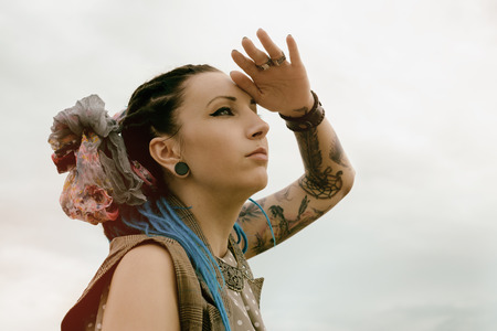 portrait of young active girl of the hipster outdoorsの写真素材