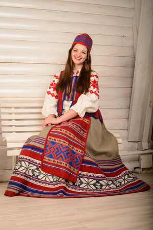 young woman in a Slavic Belarusian national original suit studioの写真素材