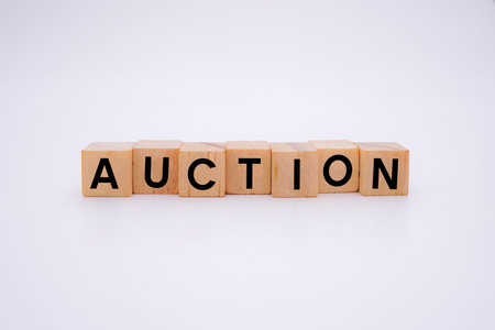 Auction Word Written In Wooden Cube