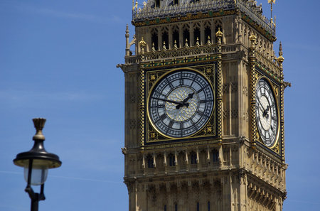 Big Ben in London in England on the blue background