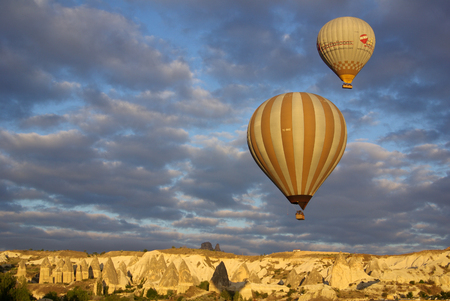GOREME, TURKEY - June 13, 2014: Hot air balloon fly over Cappadocia in Goreme, Cappadocia, Turkeyのeditorial素材