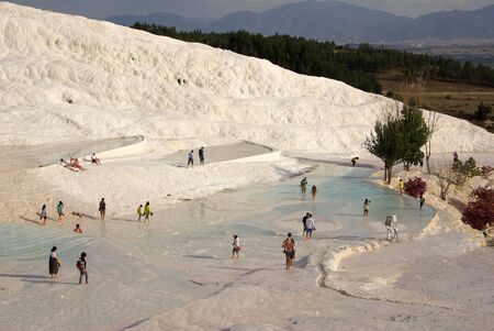 PAMUKKALE, TURKEY - June 14, 2014: Tourists swim in the pool of Pamukalleのeditorial素材
