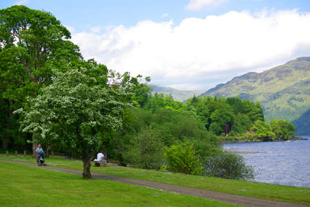 LOCH LOMOND LAKE, SCOTLAND - June, 2013: Embankment of the lakeのeditorial素材