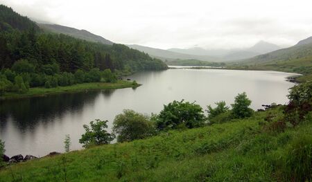View of the mountain valley in Snowdonia National Park in Walesの写真素材