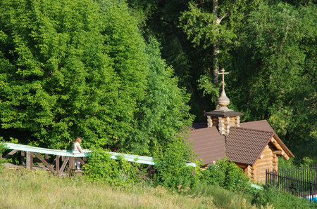 BYKOVO, MOSCOW REGION, RUSSIA - Jule, 2019: BYKOVO, MOSCOW REGION, RUSSIA - May, 2019: Chapel of the Mother of God Life-Giving Spring on the river Bykovkaのeditorial素材