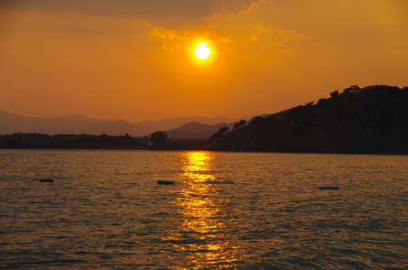 Sunset on the Calis Beach on the Aegean Seaのeditorial素材