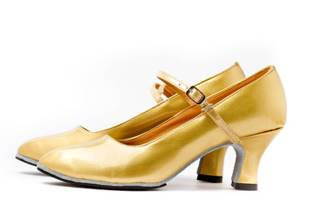 Gold high-heeled shoesの写真素材
