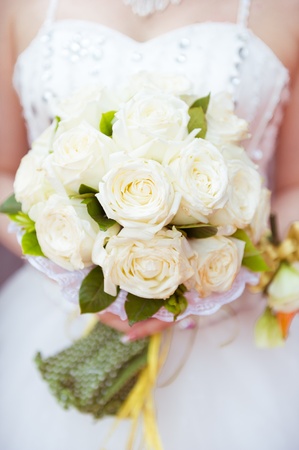 A bride  holding a bouquet of flowersの写真素材