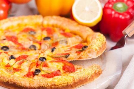Pizza on the white tableの写真素材