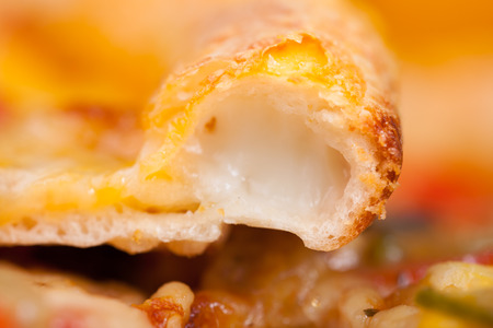 Pizza on the white tableの写真素材