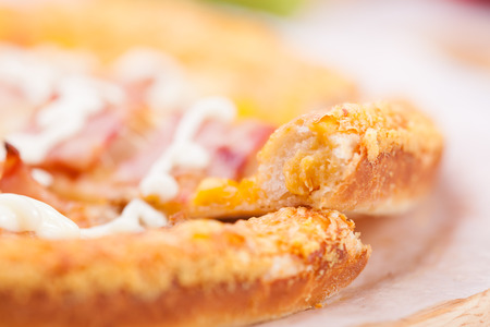 Pizza on the white tableの写真素材