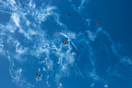 Parachute flight, air skydive, smoke bombの写真素材