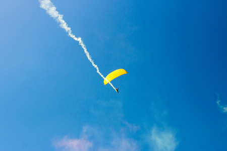 Parachute flight, air skydive, smoke bombの写真素材