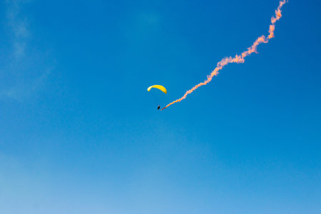 Parachute flight, air skydive, smoke bomb