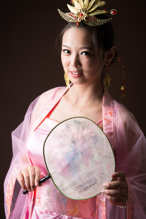 Chinese woman wearing traditional costumesの写真素材