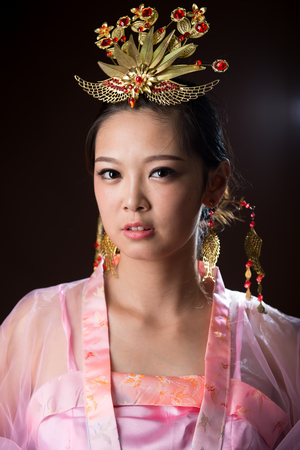 Chinese woman wearing traditional costumesの写真素材