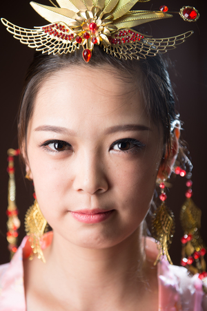 Chinese woman wearing traditional costumesの写真素材