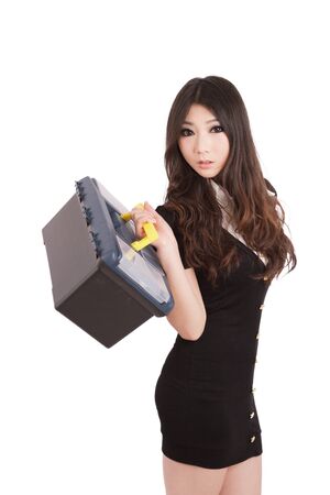 A Chinese girl holding a toolboxの写真素材