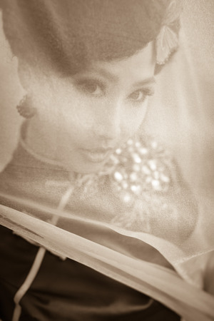 Woman wearing a cheongsam, Chinese classical costumesの写真素材