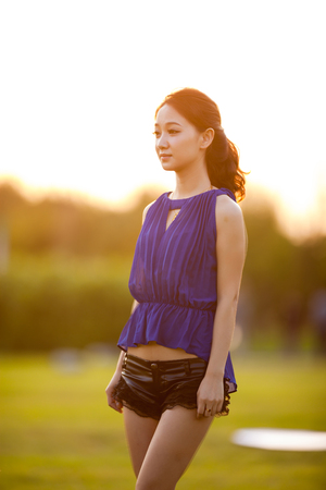 Asian beauty in green backgroundの写真素材